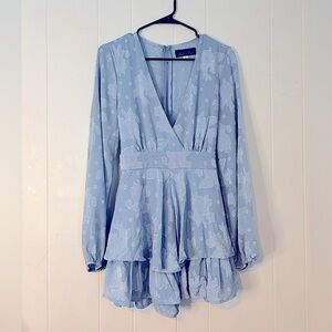 Large Blue Rain Romper with Flower Imprints. Tie Back. Zipper with Clasp